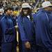 Michigan junior quarterback Denard Robinson smiles as he exits the floor with teammates after the football team was honored during a timeout at Crisler Center on Wedensday. Melanie Maxwell I AnnArbor.com